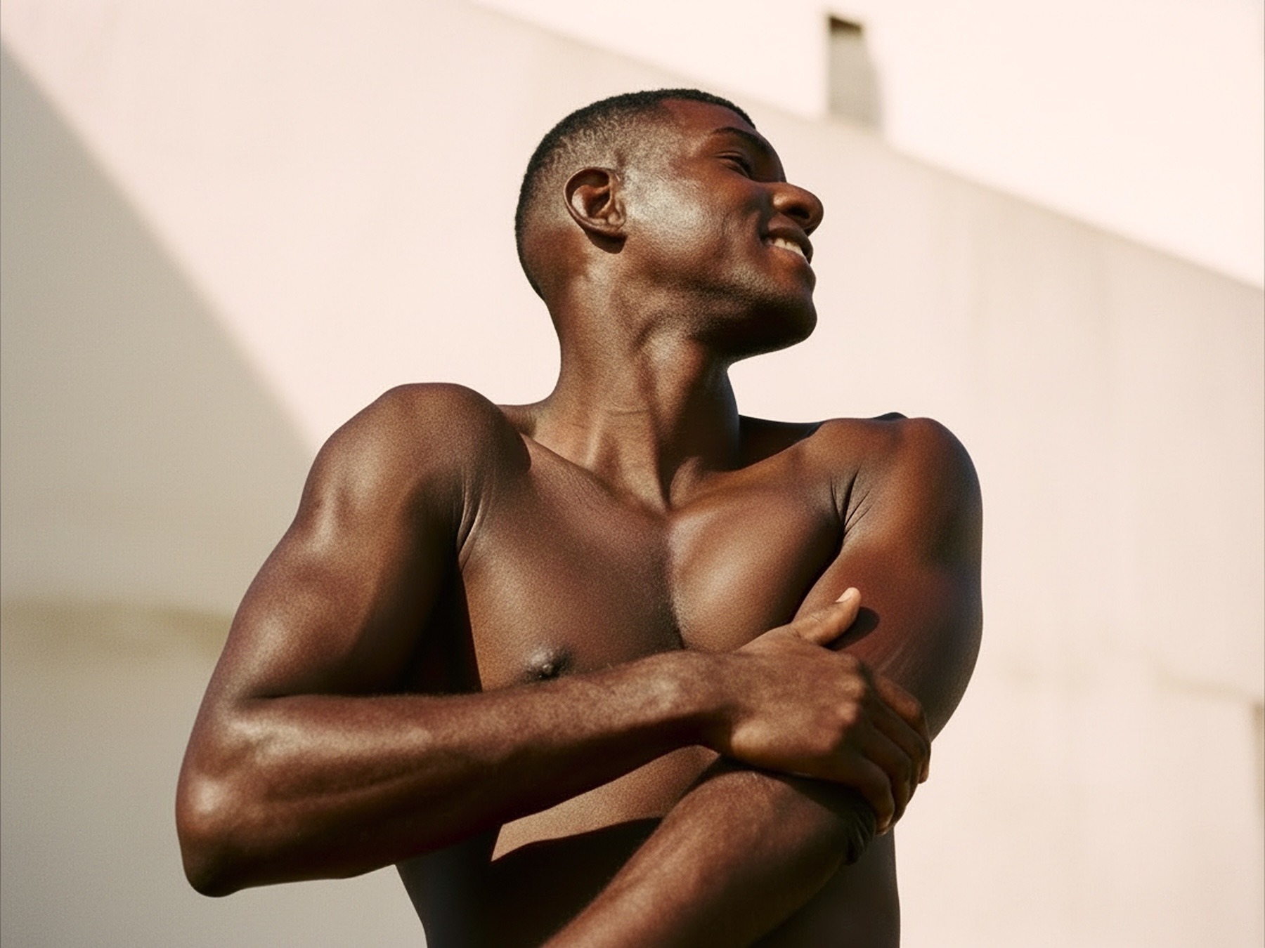 Man stretching in sun