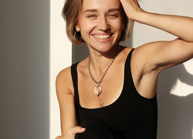 Woman smiling in sun light