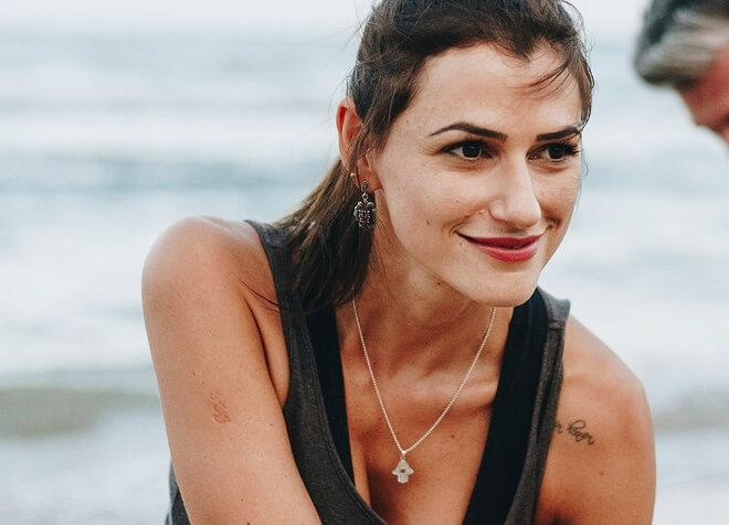 Woman smiling on beach